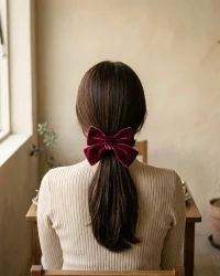 Velvet Midi Bow, worn in the hair